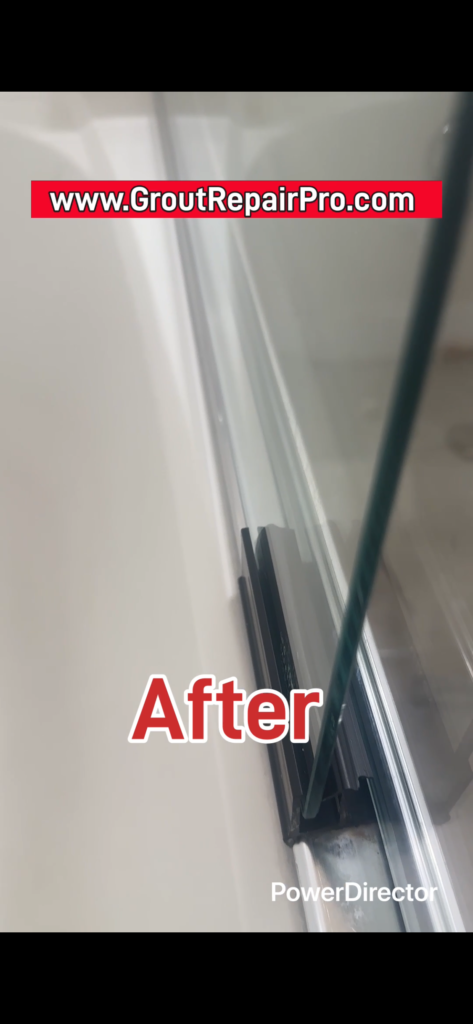 Clear shower glass door after hard water mineral deposit removal.