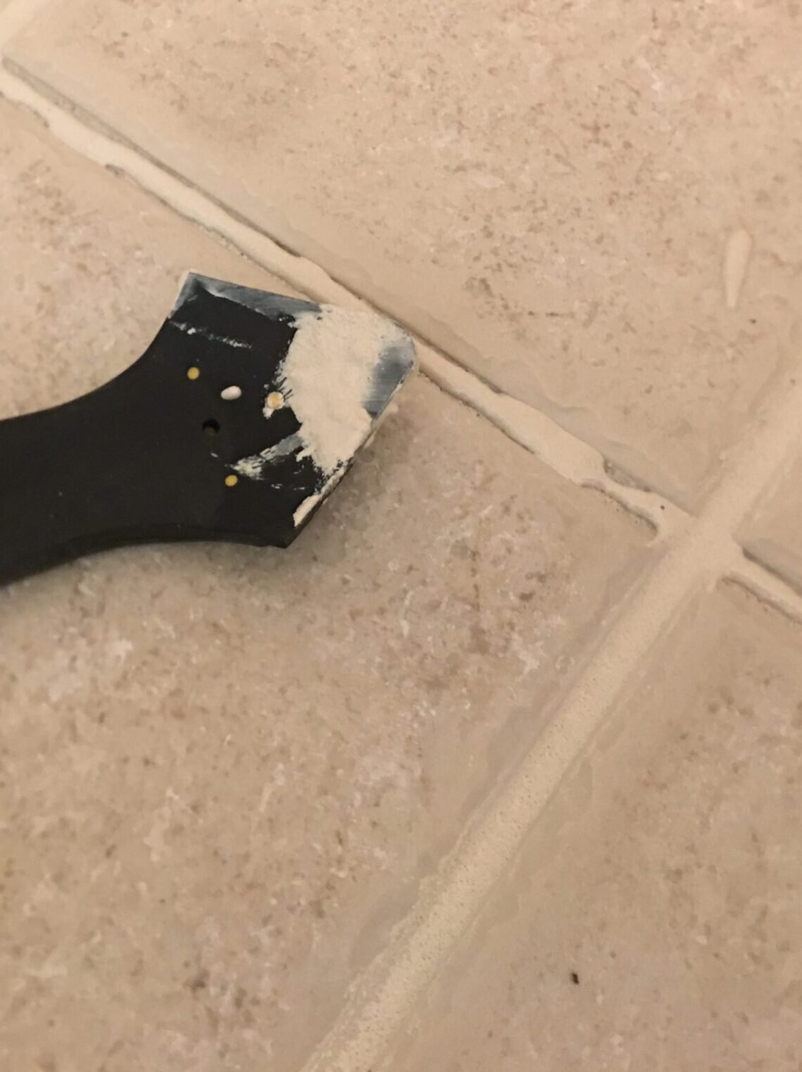 Focused regrouting and structural tile repair using professional waterproofing materials