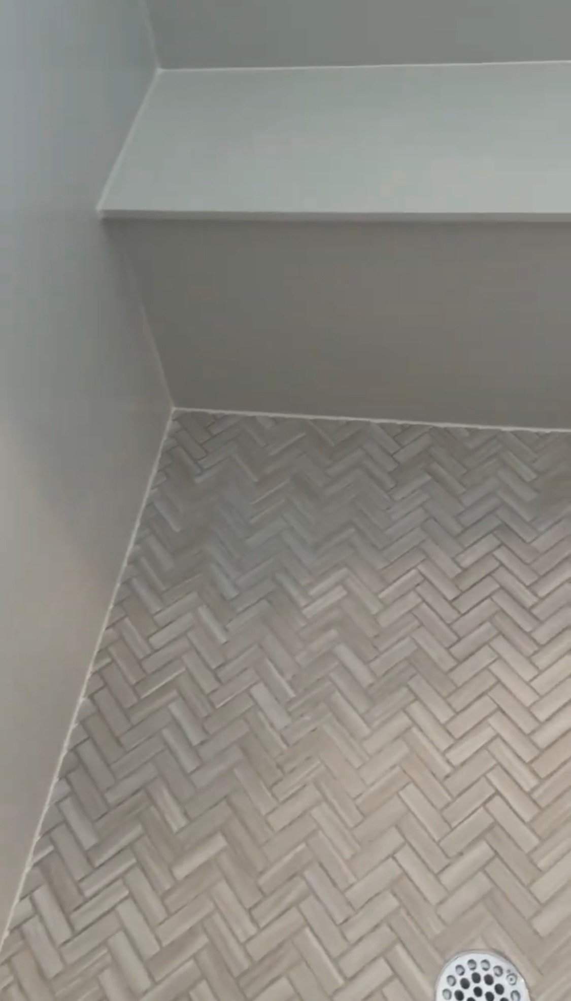 new silicone at shower floor